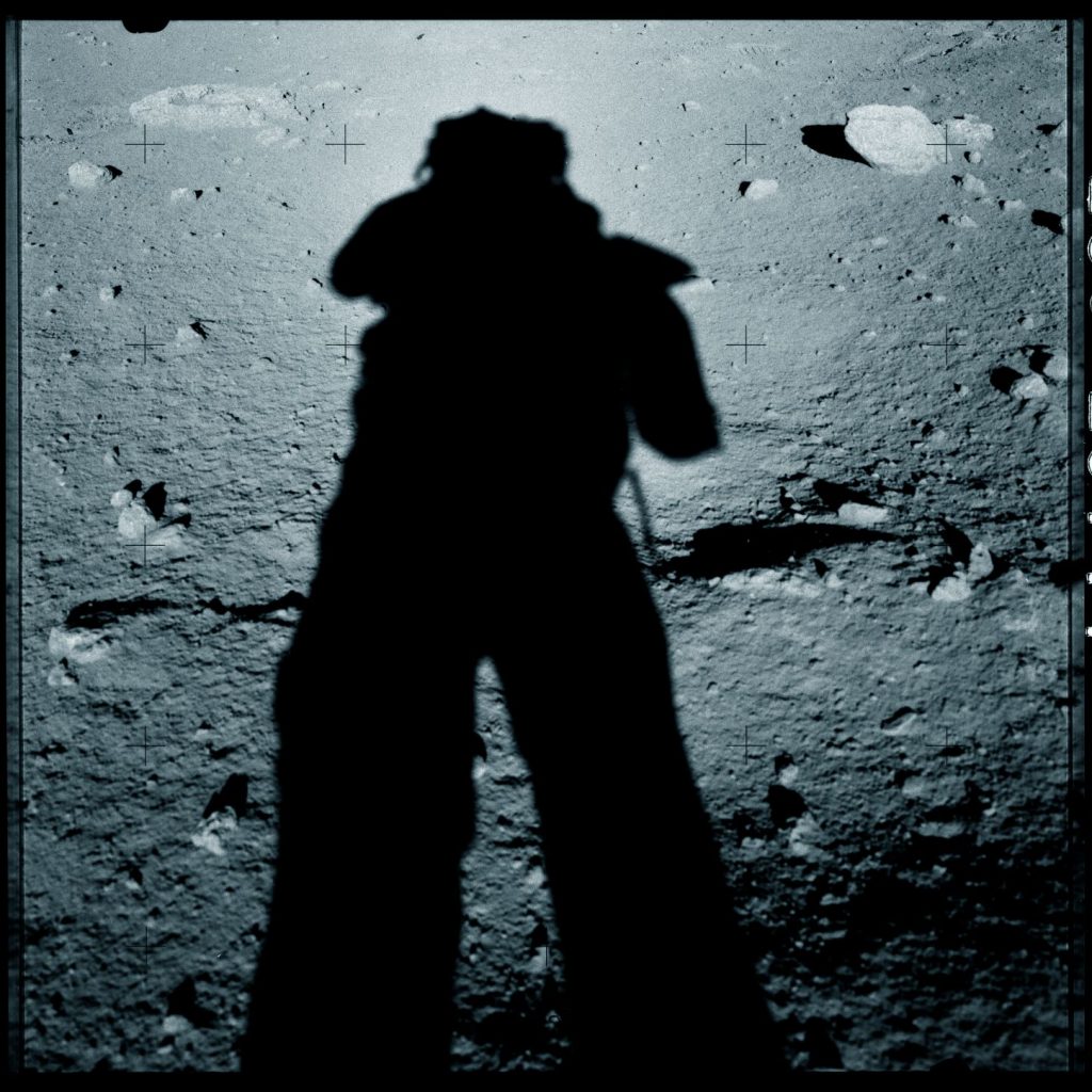 astronaut shadow on lunar surface